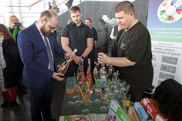 Cambrian Training Company apprentices, Aaron Jones and Oliver Addis-Fuller with Jack Sargeant, Minister for Culture, Skills and Social Partnership.