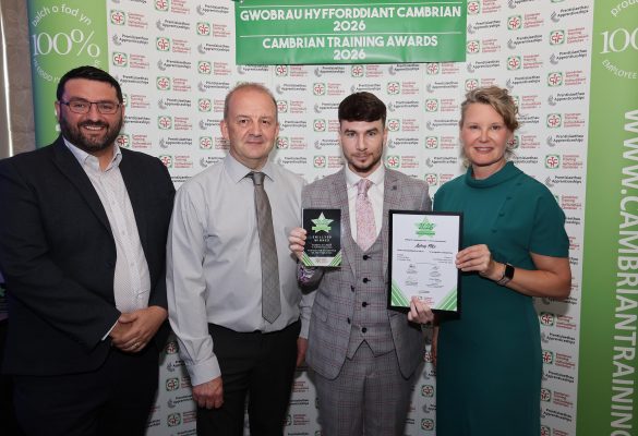 Adam Pike receives his award from Faith O’Brien, Cambrian Training Company’s managing director.